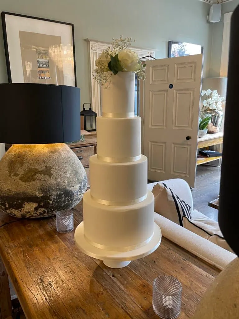 White Iced White Ribbon Wedding Cake