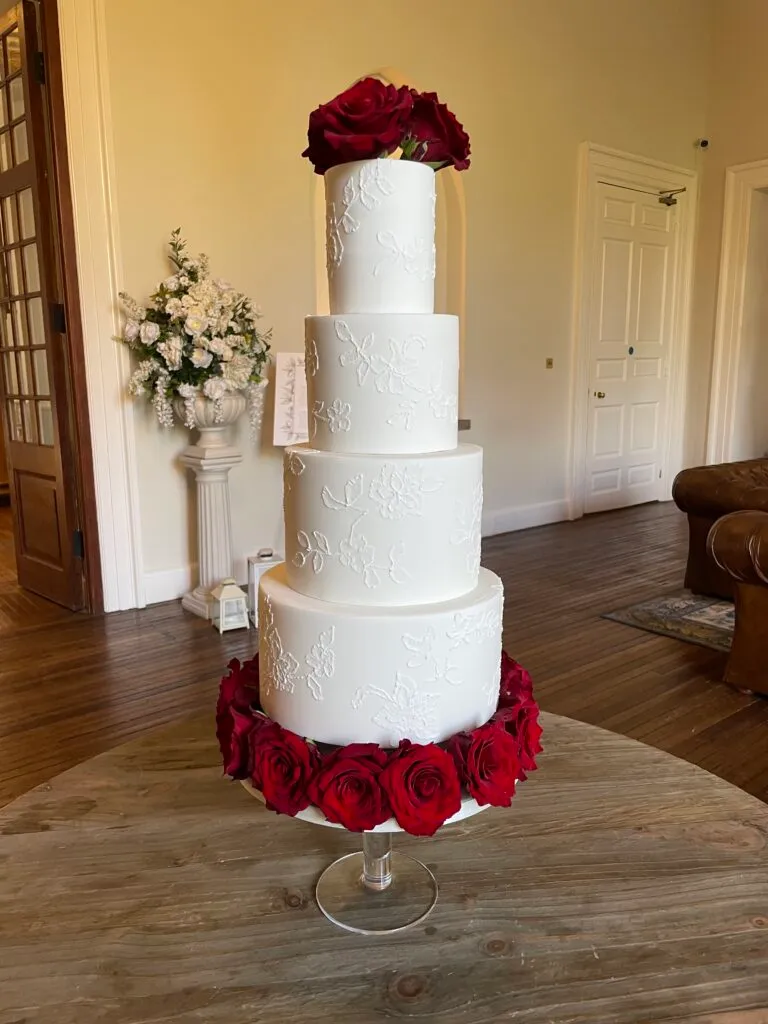 White Brush Embriodery Wedding Cake with Red Roses